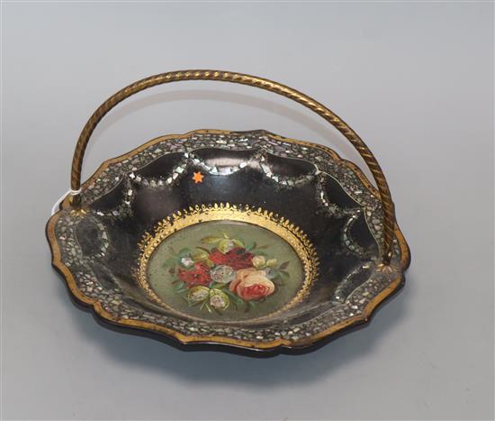 A Victorian papier mache basket, with central floral panel diameter 23cm